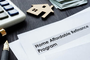 Home,Affordable,Refinance,Program,Harp,Papers,On,A,Desk.